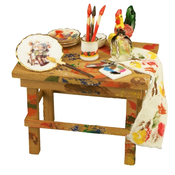 Bild von Malertisch aus Holz - dekoriert