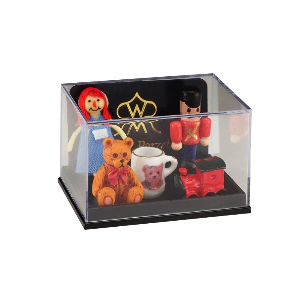 Picture of Toyland - different toys like a doll, train and a teddy bear