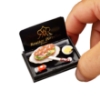 Picture of Sandwich on Serving Plate with Mustard and Knive