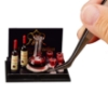 Picture of Wine Decanter with 4 Wine Glasses and 2 Bottles of Redwine