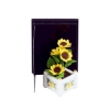 Bild von Sonnenblume im Porzellantopf