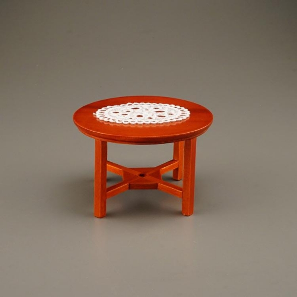 Bild von Runder Tisch mit Tischdecke