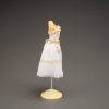 Picture of dressmaker's dummy with gold/white dress