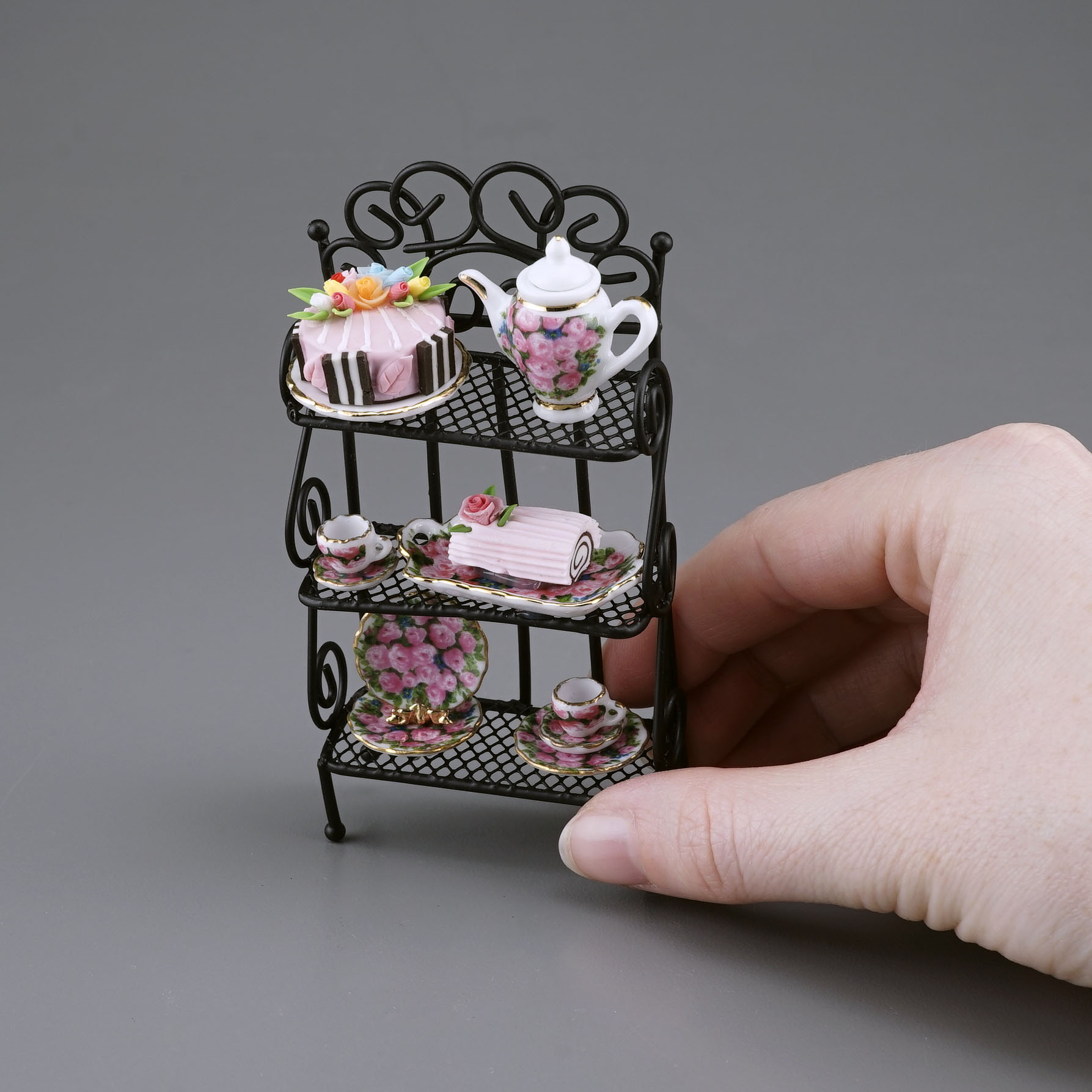Onlineshop der Reutter Miniaturen GmbH.Cake rack with Tea Set 