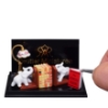 Bild von 2 Buchstützen mit Elefantenfigur, Büchern und Lampe