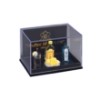 Bild von Gin Tonic Glas mit Zitronen und Gin Flaschen