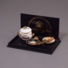 Picture of 3 fish dishes with porcelain pot